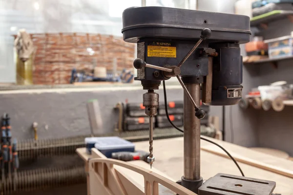 which should be done while drilling metal with the drill press